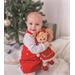 Hračka Bigjigs Toys Biele kvetinové šaty s červeným golierom pre bábiku 34 cm BJD543