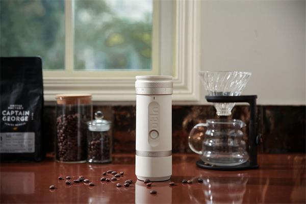 Outin Fino Elektrický mlynček na kávu, farba pieskovo biela OTCG-01-SW